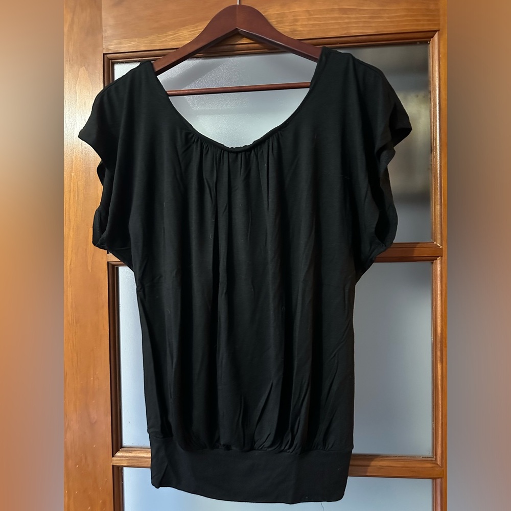 Black top with open back detail